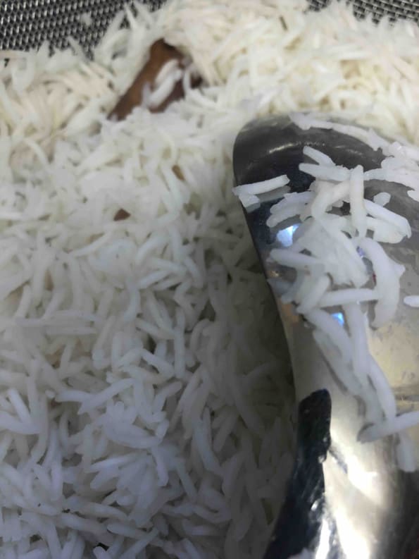 Rice draining in Colander
