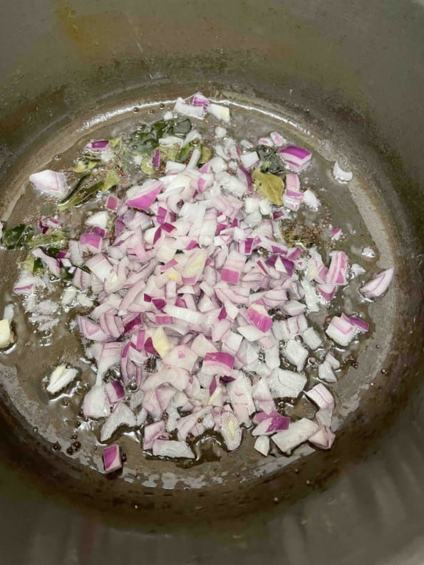 Diced onions added to pot