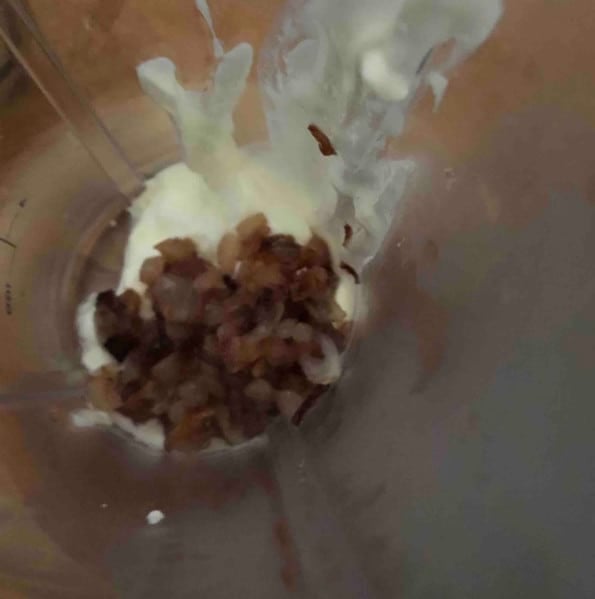 Onions and yoghurt being added to blender