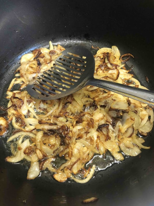 Deep Golden Brown Onions in a pot with Oil