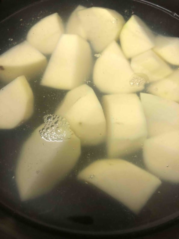 Potatoes in water in pot