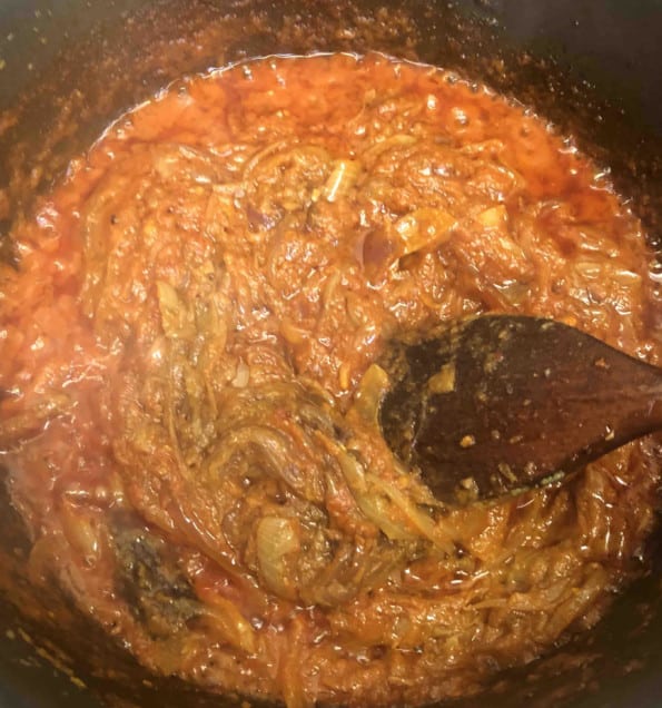 Cooked tomato base in pot