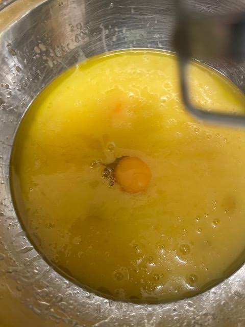Egg added to butter in bowl