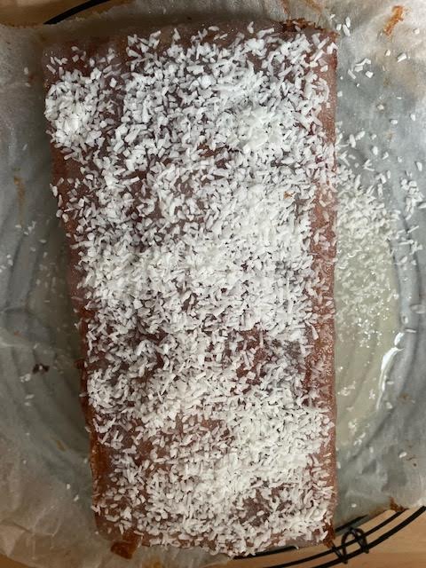 Loaf cake with desiccated coconut on top