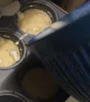 Batter added to muffin tin