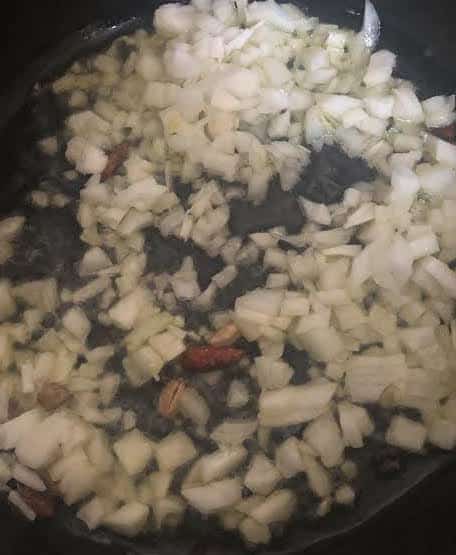 Diced onion in pot