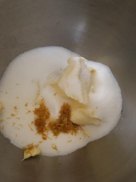 Orange, Zest and Butter in bowl of stand mixer 