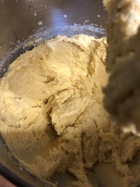 Cake batter in bowl of stand mixer