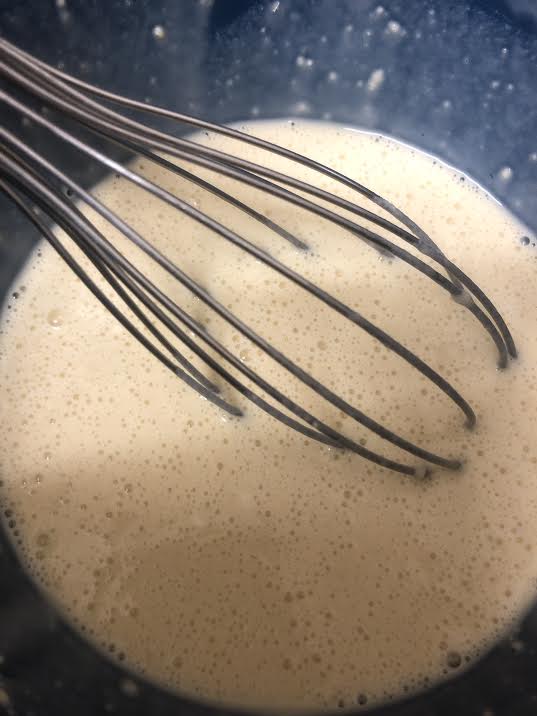 Batter being whisked in a bowl