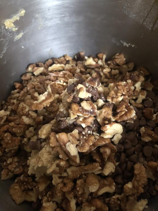 Walnuts added to bowl of stand mixer
