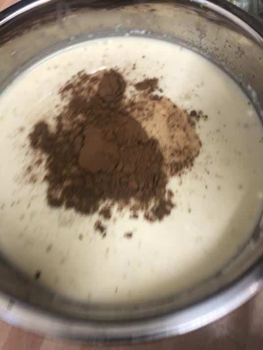 Cocoa added to milks in a bowl