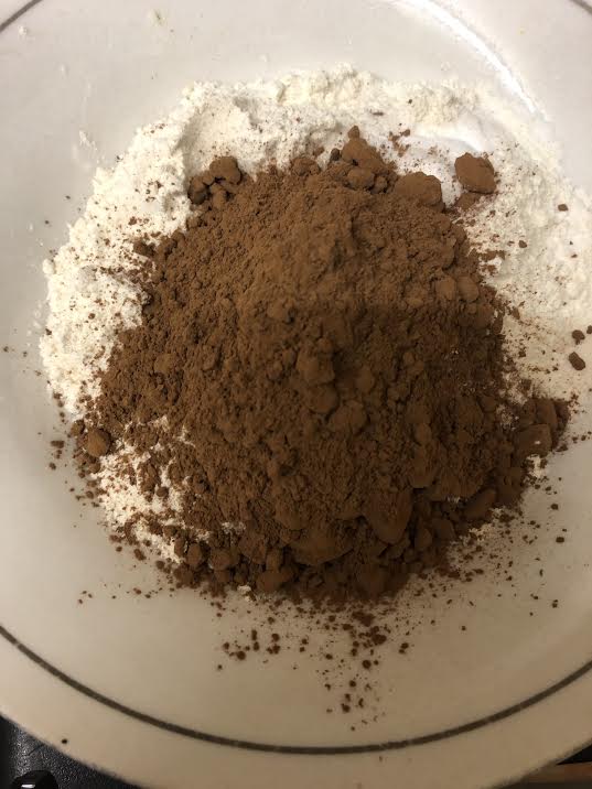 Plain Flour, Bicarb and Cocoa Powder in a bowl