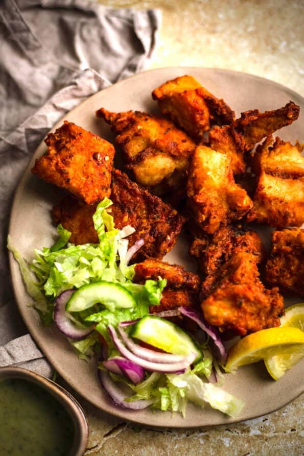 Indian fish Pakora and Salad in a plate