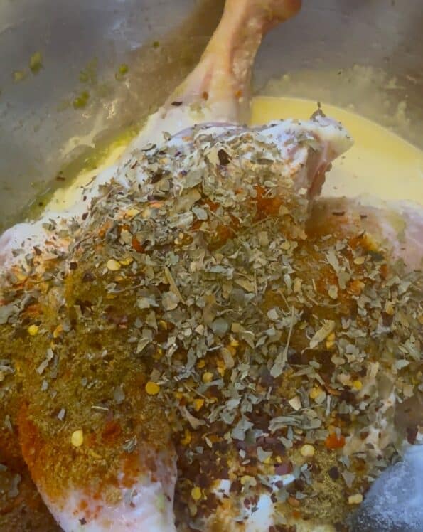 Second marinade ingredients in bowl with Chicken 
