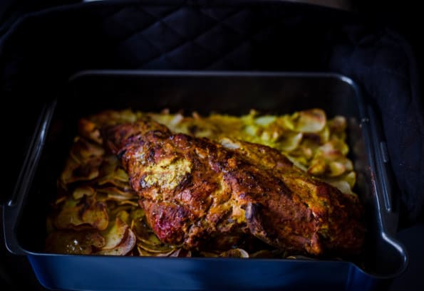 Slow cooked leg of lamb in a tray 