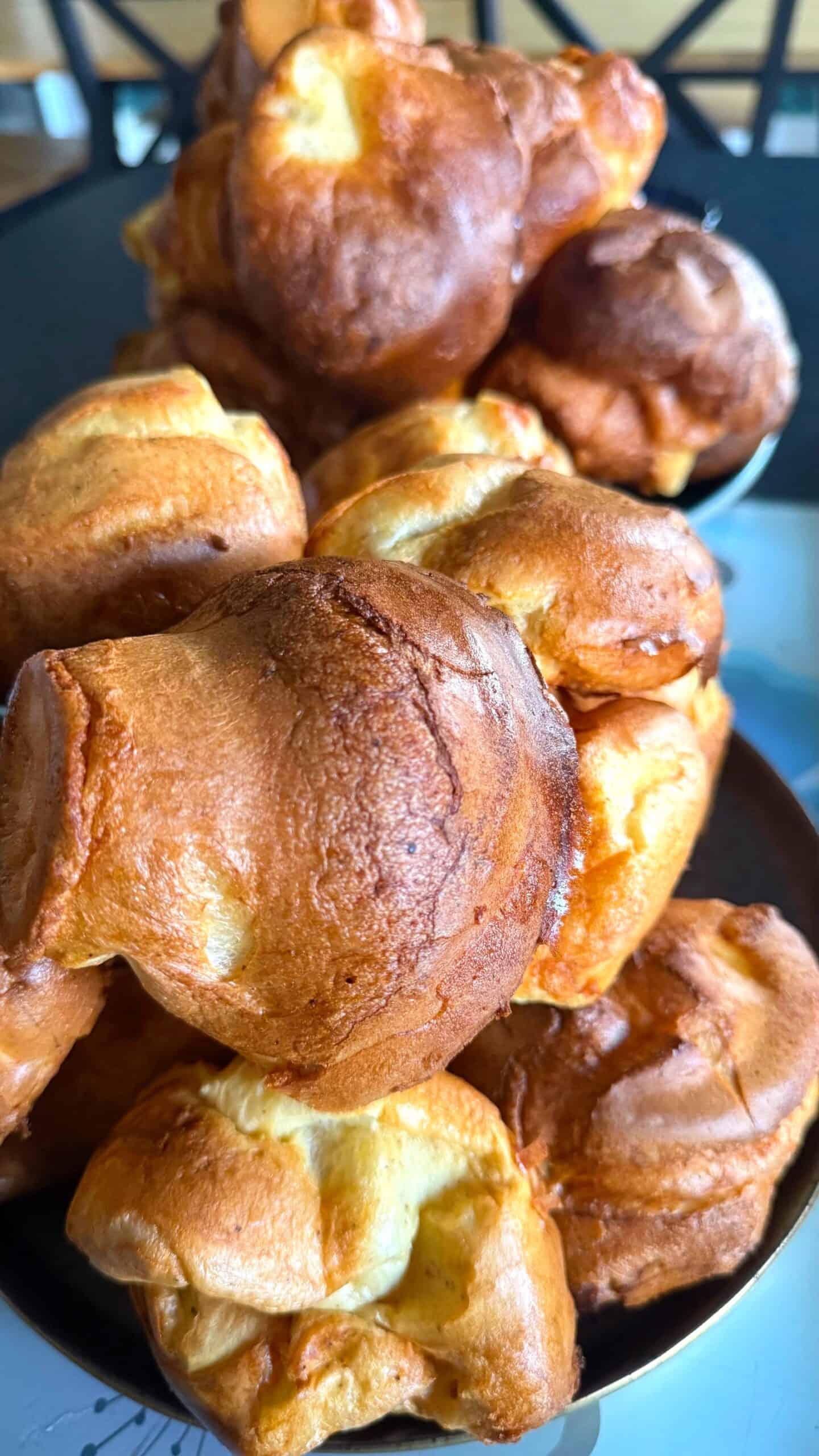 Crispy, fluffy Yorkshire puddings - (simple, fool proof and no fail) Yorkshire Puddings in plate