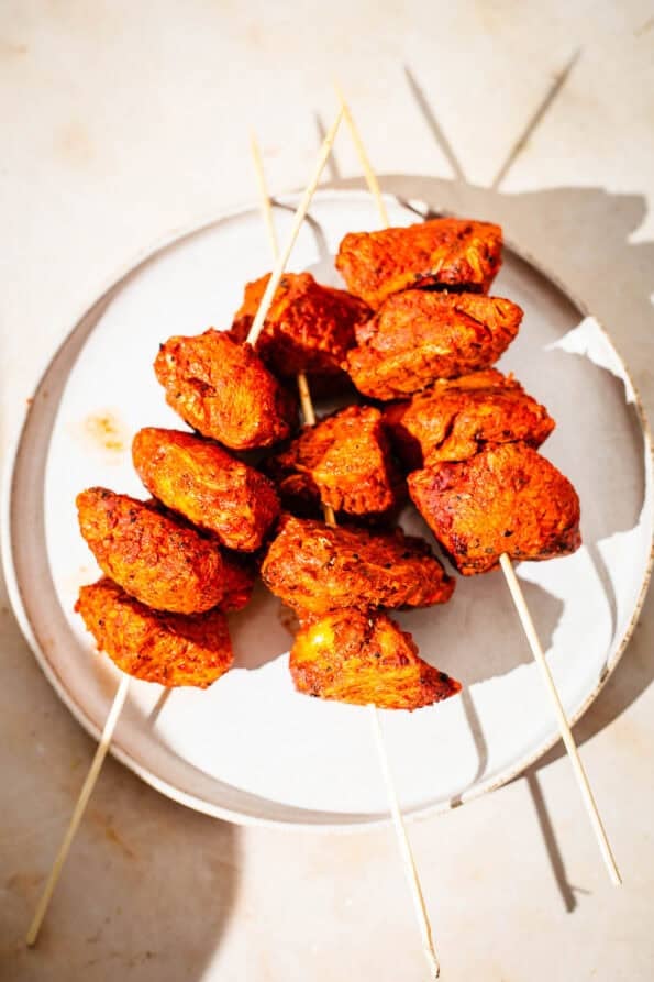 Tandoori Chicken Tikka Bites or Kebab Skewers Chicken tandoori tikka kebabs on plate