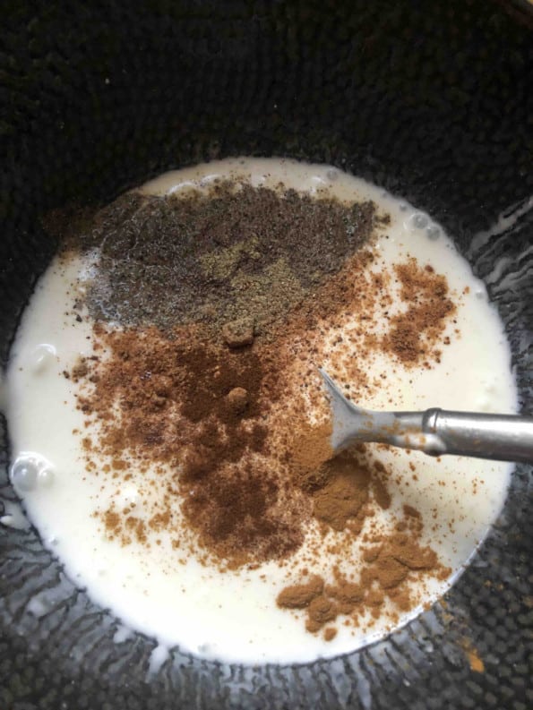 Yoghurt and ground spices in a bowl