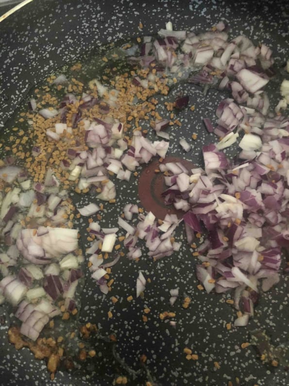 Onions and Fenugreek in a pan