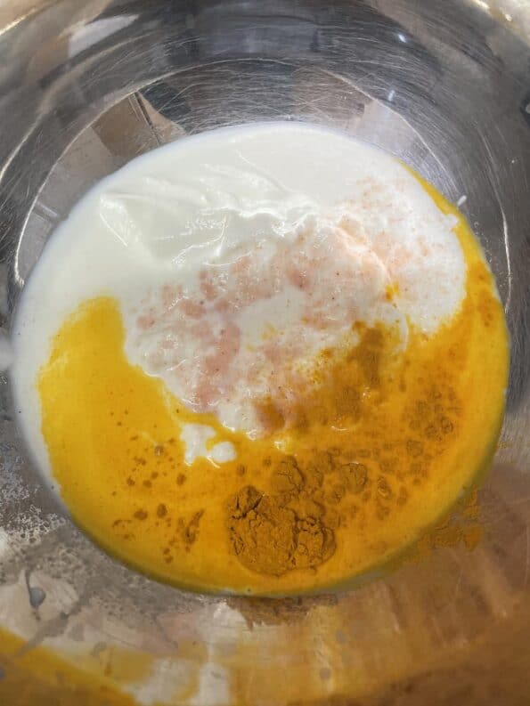 Turmeric added to Yoghurt in bowl