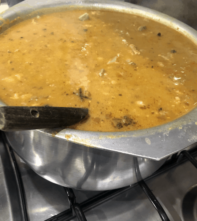 Haleem in large pot on stove