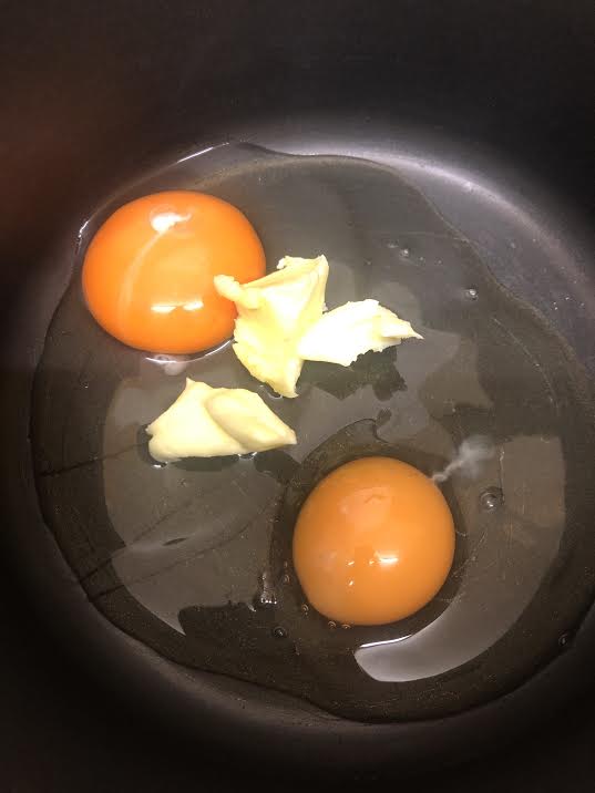 Eggs and butter in a pot