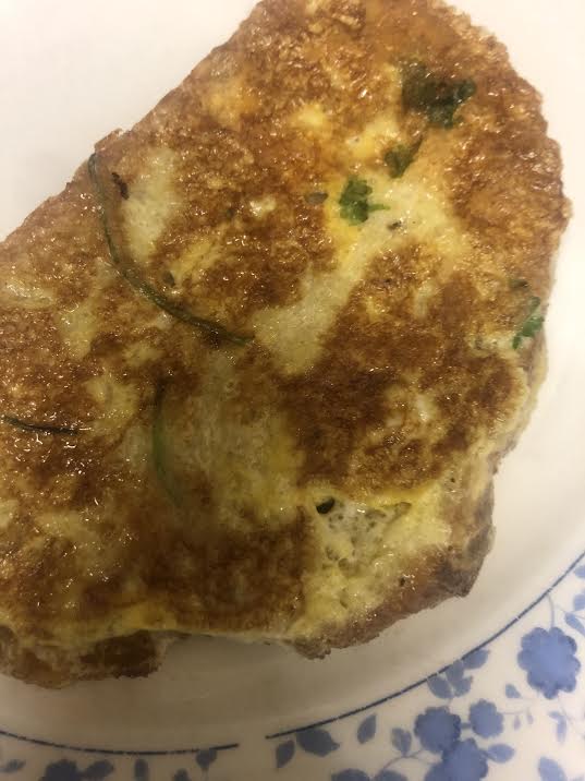 1 cooked Masala French Toast on a plate