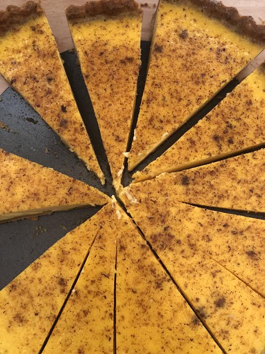 Custard Tart in slices on work surface