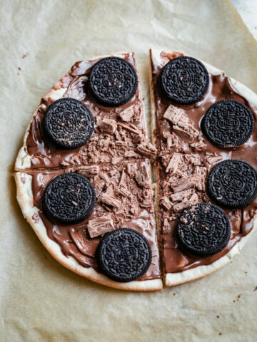 Nutella Pizza with Oreos on baking paper