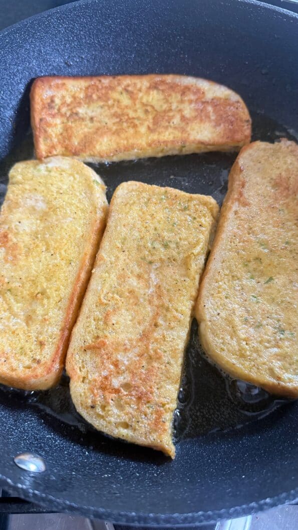 Savoury Masala French Toast Flipped masala french toast in pan
