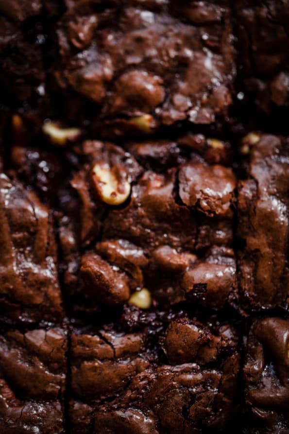 A close up of Brownies with peanuts inside