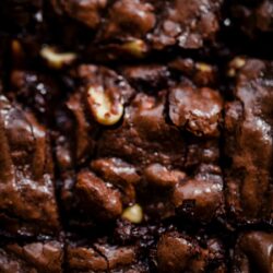 A close up of Brownies with peanuts inside