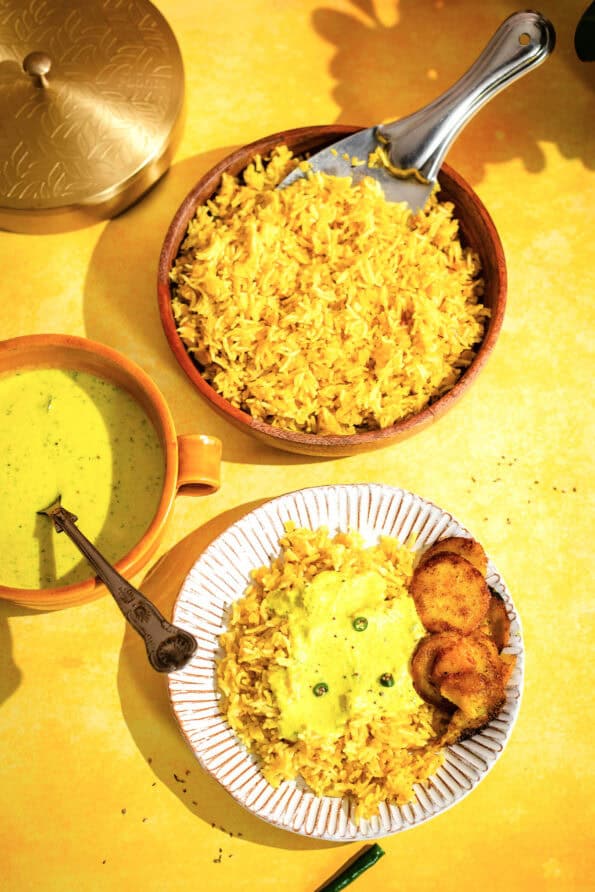 Kichdi Kari and Potato fry in plate on table