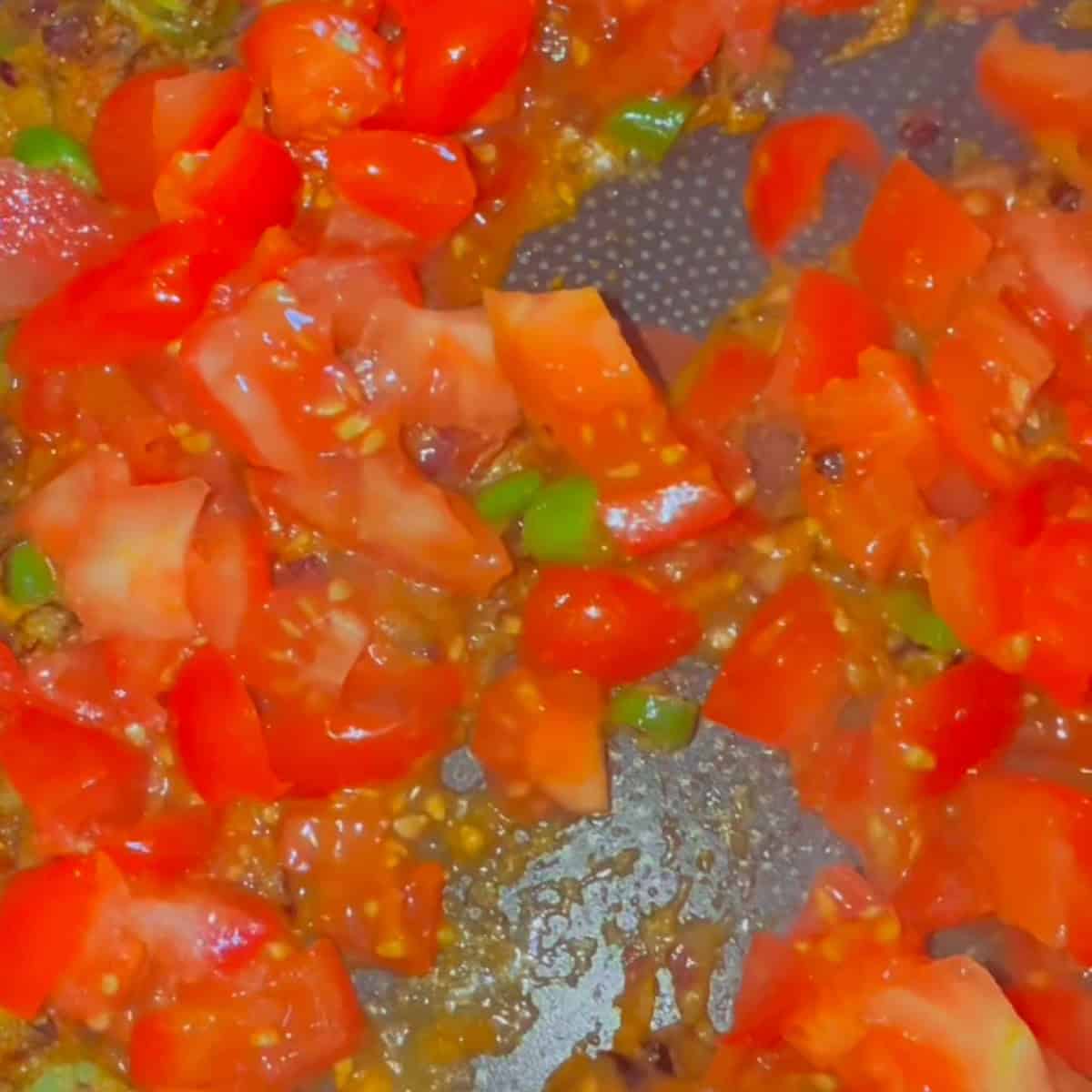 Egg Bhurji (Indian Spiced Scrambled Eggs) Tomato added to pan