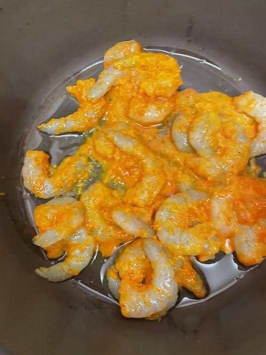 MArianded prawns in a pot