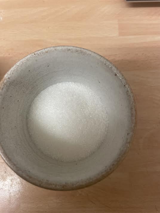 Sugar added to cup