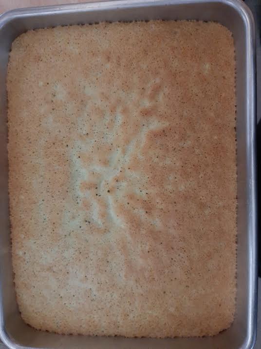 Baked Pistachio Milk Cake in a tin