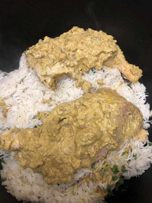 Chicken added on top of rice layer