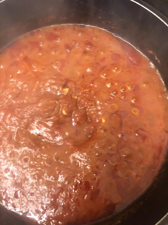 Cooked tomato sauce in pot 