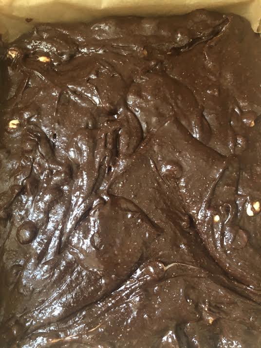 Chocolate batter added to lined tray