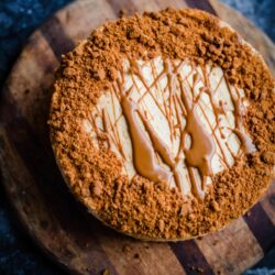 Lotus Biscoff Cheesecake on a wooden board