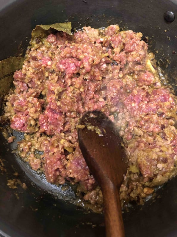 Mince being stirred in pot
