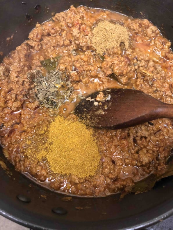 Curry powder and dry fenugreek added to pot