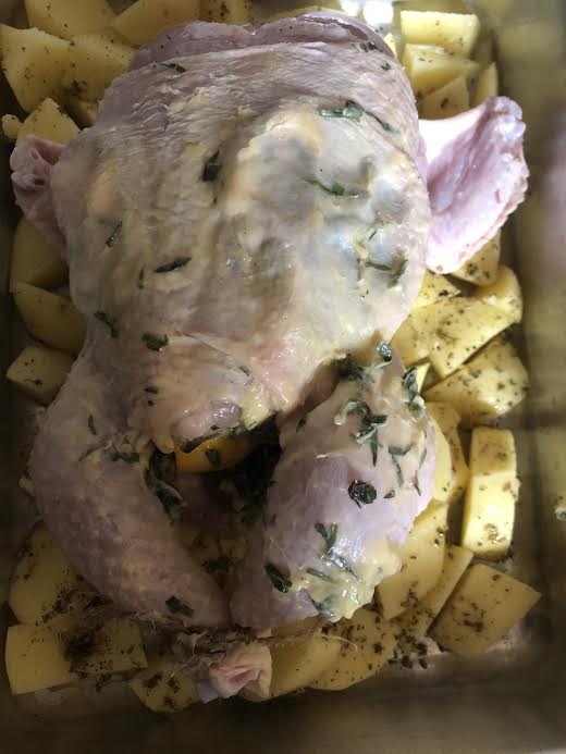Chicken added to tin of potatoes