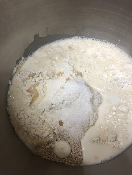 Milk added to bowl of stand mixer