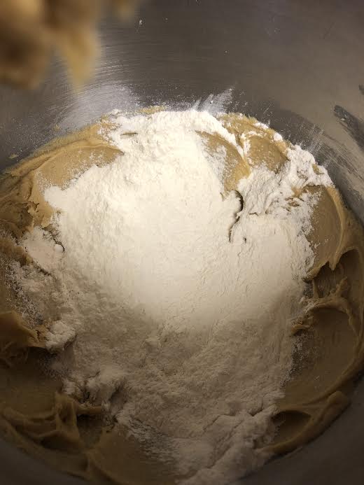 Flour added to batter in bowl