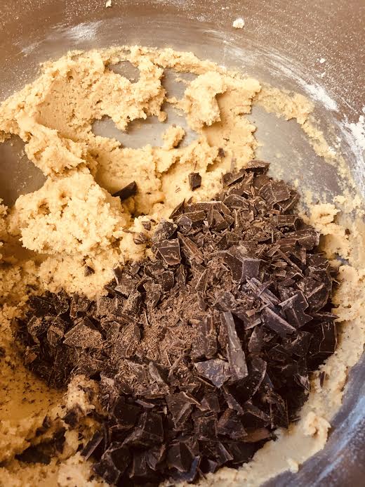 Chocolate added to batter in bowl of stand mixer