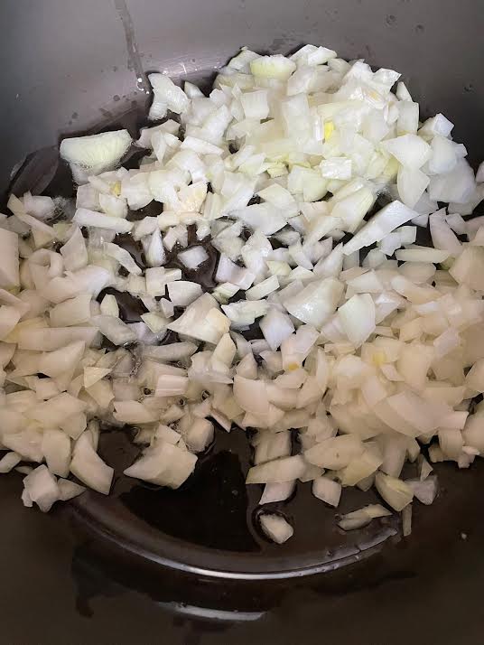 Onion in oil and butter in pot