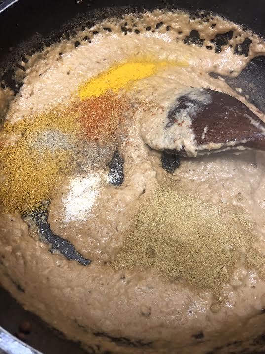 Ground Spices added to pot