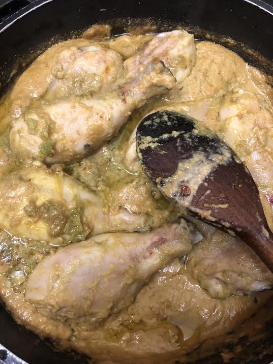 Chicken added to pot